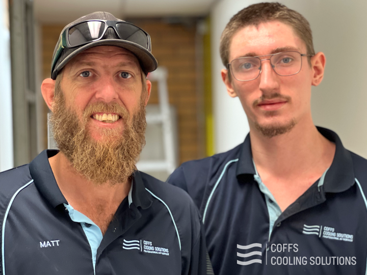 Matt Hammond and a team member in navy Coffs Cooling Solutions polos